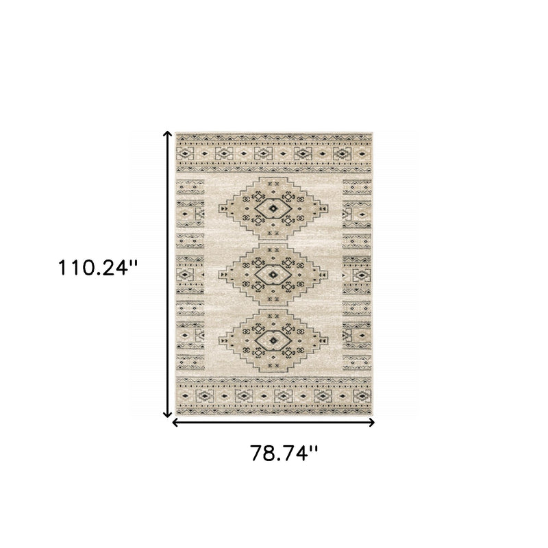 6' X 9' Ivory Grey Black And Ivory Southwestern Power Loom Stain Resistant Area Rug